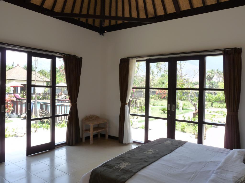 Taman Dewi Sri Villa et Bungalow Pemuteran Rum bild