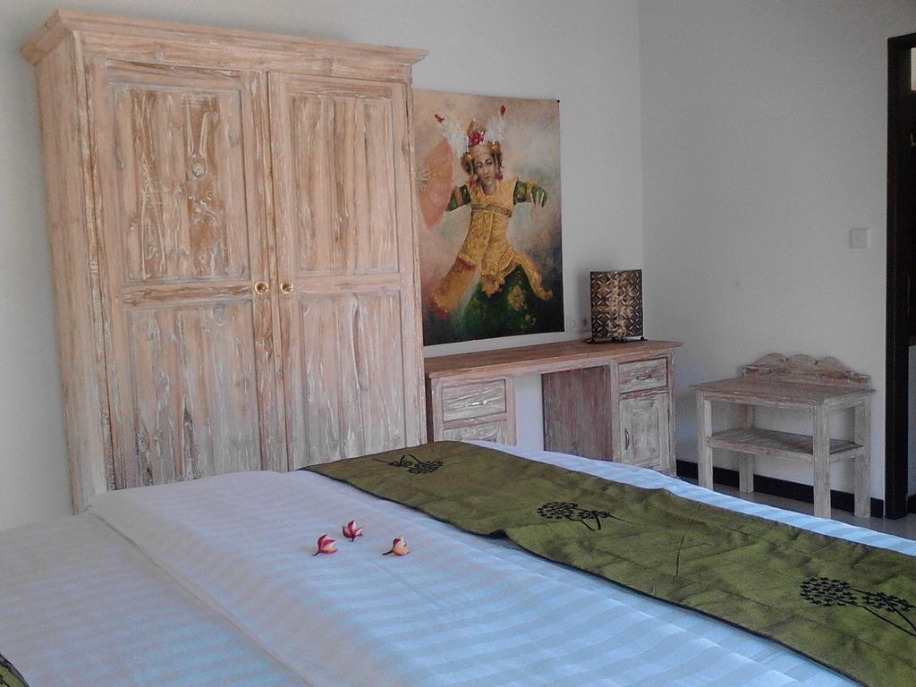 Taman Dewi Sri Villa et Bungalow Pemuteran Rum bild